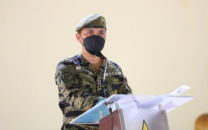 <p>Incoming Special Forces Regiment (Airborne) Commander Col. Ferdinand B. Napuli delivers an assumption speech during the regiment's Change of Command Ceremony on Wednesday (May 11, 2022) at Fort Magsaysay, Nueva Ecija. <em>(Photo courtesy of the PA)</em> </p>