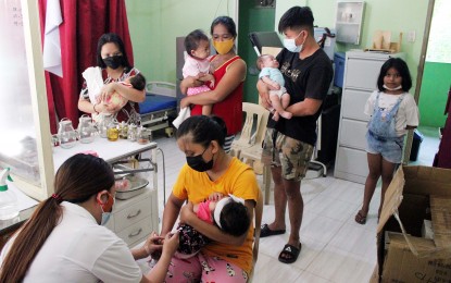 <p><strong>PROTECTION FOR BABIES</strong>. Administration of oral polio vaccine at the Barangay Hall, Salitran 3, Dasmarinas City, Cavite in this file photo taken May last year. The country's coverage for vaccine-preventable diseases (VPDs) among children is below 60 percent, a health expert said Friday (April 28, 2023). <em>(PNA file photo)</em></p>