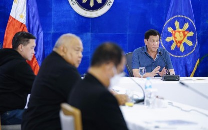 <p><strong>NO CHEATING.</strong> President Rodrigo Roa Duterte presides over a meeting with key government officials prior to his "Talk to the People" at the Arcadia Active Lifestyle Center in Matina, Davao City on Wednesday night (May 11, 2022). Duterte said he is convinced that there was no cheating or other voting irregularities in the recent May 9 polls. <em>(Presidential photo by Joel Dalumpines)</em></p>