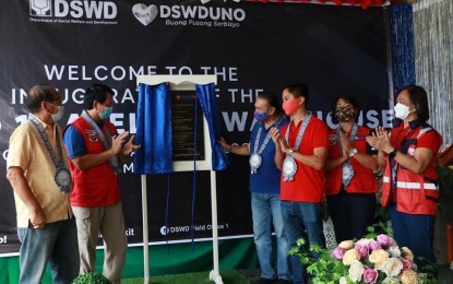 <p><strong>SOFT INAUGURATION</strong>. Officials of the Department of Social Welfare and Development led by Secretary Rolando Joselito Bautista along with provincial and city officials witness the soft inauguration of the first satellite warehouse of the DSWD outside La Union province. The building cost PHP41 million and is expected to be completed in July. <em>(Photo courtesy of the DSWD Field Office 1)</em></p>