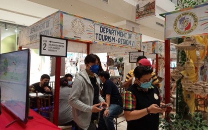 <p><strong>ACCREDITATION BOOTH</strong>. The Department of Tourism (DOT)-Western Visayas “Accreditation on Wheels” booth in the ongoing Lakbayanihan Tourism Fair 2022 at the Ayala Malls Capitol Central in Bacolod City. An accreditation from the DOT officially recognizes a tourism establishment’s compliance with minimum standards for operation.<em> (PNA photo by Nanette L. Guadalquiver)</em></p>