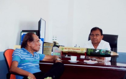 <p><strong>LAST VISIT.</strong> Former Rep. Guimid “Jimmy” Matalam (left) of Maguindanao’s second district is shown in this 2021 photo visiting the mayor of his hometown, Mayor Salik Mamasabulod, a relative. Matalam died Tuesday night (May 17, 2022) at the family's ancestral home in Pagalungan, Maguindanao. <em>(Photo courtesy of Mayor Salik Mamasabulod)</em></p>