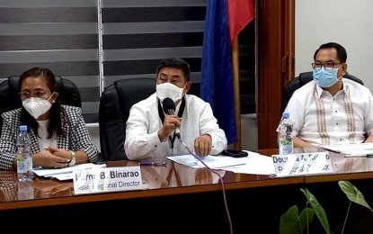 <p><strong>TAX CLEARANCES</strong>. Bureau of Internal Revenue in the Cordillera regional director Douglas Rufino (center) says the Commission on Elections should make the submission of tax clearance a requirement in the filing of candidacy, during a press conference in Baguio City on Wednesday (May 18, 2022). This ensures that the donations received by candidates are accounted for and properly taxed. <em>(PNA photo by Liza T. Agoot)</em></p>