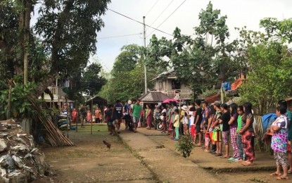 <p><br /><strong>SLAIN</strong>. Residents of San Francisco village in Las Navas, Northern Samar lined up in this May 12 photo to honor a soldier killed in an event in their village. About 400 residents in Las Navas, Northern Samar joined a condemnation rally on Thursday (May 19, 2022) triggered by last week's fatal shooting of the team leader of the Community Support Program in the area. <em>(Photo courtesy of Philippine Army)</em></p>