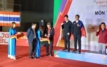 <p>Grand Master Sergeant Darwin Laylo and his teammate, International Master Paulo Bersamina, during the awarding ceremony for the Men's Chess Team Rapid in Hanoi, Vietnam on May 19, 2022. <em>(Photo courtesy of the National Chess Federation of the Philippines) </em></p>