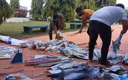 <p><strong>TAKEN DOWN</strong>. Personnel of the Batad Municipal Environment and Natural Resources Office (MENRO) sort out collected tarpaulins and other campaign materials as part of the Limpyo (clean) Eleksyon campaign of Iloilo Province. As of Friday (May 20, 2022) over 10 tons of assorted materials have been taken down and gathered as per the report of the Provincial Environment and Natural Resources Office (PGENRO).<em> (Photo courtesy of Batad MENRO)</em></p>