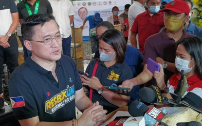<p><strong>SPECIAL GUEST.</strong> Senator Christopher "Bong" Go (left) answers questions from the media after leading the groundbreaking ceremony of the four-story building of Valenzuela Medical Center in Barangay Karuhatan, Valenzuela City on Friday (May 20, 2022). Go said he is open to retaining chairmanship of the Committee on Health.<em> (PNA photo by Joey Razon)</em></p>