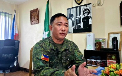 <p><strong>SEIZED THE MONEY</strong>. Brig. Gen. Jesus Durante III, commander of 1001st Infantry Brigade, discloses on Saturday (May 21, 2022) that Eric Jun Casilao alias "Elian" or "Wally," the secretary of the Southern Mindanao Regional Committee (SMRC), has abandoned his comrades and fled with the party's money worth PHP6 million. He said Casilao is no longer thinking about the welfare of the armed group and prioritizes extortion activities. <em>(PNA photo by Che Palicte)</em></p>