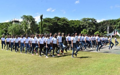 <p><strong>READY TO SERVE.</strong> Aspiring soldiers march during a welcome ceremony at the 6th Infantry Division parade grounds in Camp Gen. Gonzalo Siongco in Barangay Awang, Datu Odin Sinsuat, Maguindanao on Friday afternoon (May 20, 2022). They will be based at the 6th Division Training School where they will undergo a four-month training. <em>(Photo courtesy of 6th Infantry Division-PIO)</em></p>