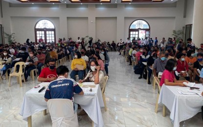 <p><strong>PASSPORT ON WHEELS</strong>. Ilocos Sur residents line up to avail of the passport on wheels program of the Department of Foreign Affairs in partnership with the provincial government. The pre-screening runs from May 23 to 26, 2022. <em>(Photo courtesy of PIA Ilocos Sur)</em></p>