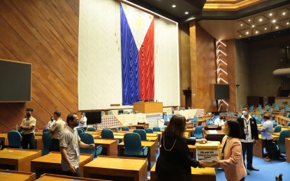 <p><strong>TURNOVER</strong>.  The Senate transfers 156 or 90.17 percent out of the 173 Certificates of Canvass (COCs) and Election Returns (ERs) to the House of Representatives in Quezon City around 5 a.m. on Monday (May 23, 2022). The Senate and the House of Representatives convened as the National Board of Canvassers (NBOC) in a joint session on Tuesday (May 24, 2022) to tally the votes for the 2022 presidential and vice-presidential elections. <em>(Photo courtesy of Senate PRIB)</em></p>