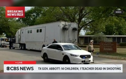 <p><strong>SCHOOL SHOOTING</strong>. The screenshot taken from the live streaming of CBS News shows staff members and vehicles in front of the Robb Elementary School in Uvalde, Texas, where a gunman killed 21 people, including 18 children and a teacher, on Tuesday (May 24, 2022). US President Joe Biden has ordered that the flags at the White House, federal buildings, and military posts be flown at half-staff as a mark of respect for the victims. <em><strong>(Xinhua)</strong></em></p>