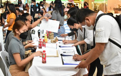 <p><strong>PESO JOB FAIR</strong>. Applicants fill out forms during a job fair held in Dumaguete City in April which was initiated through the Public Employment Service Office (PESO). The city government is eyeing to put up PESO employment help desks in each of the 30 barangays to speed up the collection of data as well as facilitate the needs of the unemployed. <em>(Photo courtesy of PESO Dumaguete Facebook)</em></p>