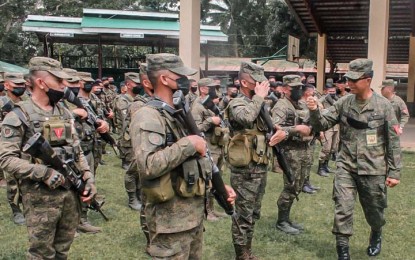 <p><strong>FORCES REPOSITIONED.</strong> Brig. Gen. Leonel Nicolas (right), 102nd Infantry Brigade commander, sends off the troops to be deployed against New People’s Army rebels in Misamis Occidental on Saturday (May 28, 2022). The brigade targets to defeat the Guerrilla Front Sendong, the last remaining organized front of the NPA’s Western Mindanao Regional Party Committee, by June. <em>(Photo courtesy of 102nd Infantry Brigade)</em></p>