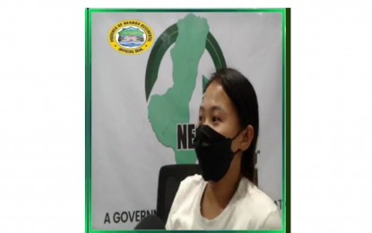 <p><strong>A BETTER LIFE AHEAD</strong>. Rachelle, 22, and a former teenage fighter of the CPP-NPA in Negros Occidental, wants to become a soldier after completing her studies. She said in an interview over Radyo Negrense on Monday (May 30, 2022) she was only 17 when she joined the NPA but decided to surrender after she was raped by her platoon leader. <em>(Screengrab from Radyo Negrense Facebook page)</em></p>