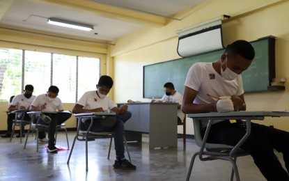 <p><strong>ELIGIBILITY EXAM</strong>. Members of the Moro Islamic Liberation Front and Moro National Liberation Front take the National Police Commission’s Special Qualifying Eligibility Examination in Cotabato City on Sunday (May 29, 2022). A total of 5,060 successful examinees will be granted eligibility for temporary appointment as patrolman/woman of the PNP <em>(Photo courtesy of OPAPRU)</em></p>