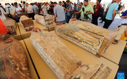 <p><strong>ARCHAEOLOGICAL FIND.</strong> Photo taken on May 30, 2022 shows colored coffins containing mummies during an archaeological achievements exhibition at Saqqara necropolis, south of Cairo, Egypt. Egypt unveiled on Monday a major new archaeological find of 250 sealed coffins containing mummies, 150 bronze statues of ancient gods and goddesses, and other antiquities at the Saqqara necropolis, south of the capital Cairo. <em>(Xinhua/Sui Xiankai)</em></p>