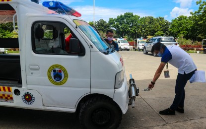 <p><strong>RESCUE VEHICLES</strong>. Personnel from the Davao Oriental provincial disaster risk reduction and management office inspect the newly-acquired rescue vehicles of the province on Tuesday (May 31, 2022). The new rescue vehicles are intended to improve disaster response of the 50 barangay disaster risk reduction and management committees in geographically isolated and disadvantaged areas of the province.<em> (Photo courtesy of Davao Oriental PIO)</em></p>
