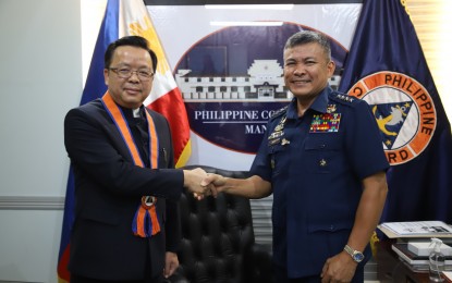 <p>Chinese Ambassador to the Philippines Huang Xilian (left) and Philippine Coast Guard Commandant Admiral Artemio Abu <em>(Photo courtesy of PCG)</em></p>