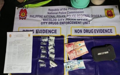 <p><strong>SHABU SEIZED</strong>. Operatives of Bacolod City Police Office City Drug Enforcement Unit seize P428,400 worth of illegal drugs from suspect Mugdan, 48, a high-value individual, during a buy-bust in Barangay 4 on May 19, 2022. The haul was part of the total P6.881 million in suspected shabu seized by the city police personnel last month. <em>(Photo courtesy of Bacolod City Police Office)</em></p>