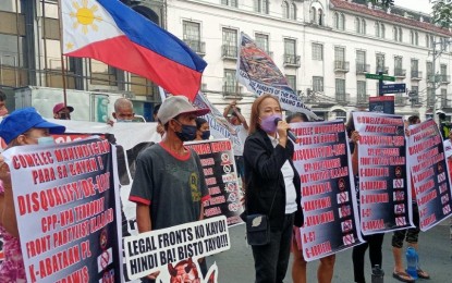 <p><strong>DQ PROTEST.</strong> Anti-Reds groups led by the League of Parents of the Philippines hold a rally in front of the Commission on Elections main office in Intramuros, Manila on Monday (June 6, 2022). They called again for the delisting of communist affiliated party-list groups. <em>(Contributed photo)</em></p>
