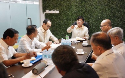 <p><strong>BBM IN CHARGE.</strong> President-elect Ferdinand “Bongbong” Marcos Jr. presides over the meeting with the members of his economic team led by Finance Secretary-designate Benjamin Diokno at his headquarters in Mandaluyong City on June 6, 2022. Marcos’ economic team released a briefer on Sunday (June 19) saying strong fundamentals and brighter macroeconomic prospects provide room for optimism despite multiple challenges. <em>(Photo courtesy of BBM Media Bureau)</em></p>