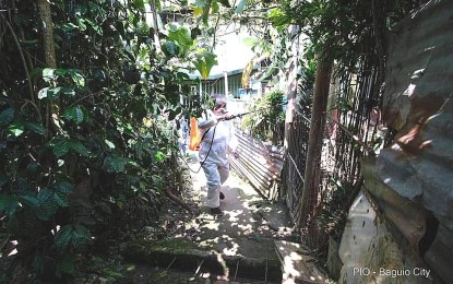 <p><strong>DENGUE PREVENTION</strong>. Sanitation Division chief Charles Carame leads a spraying operation against dengue in this photo taken on the first week of June 2022 in Baguio City where clustering of cases has been recorded. The city government recorded 241 cases in the first five months of the year, with clustering logged in 13 villages, almost double the 121 cases in the same period in 2021. <em>(PNA photo courtesy of PIO-Baguio)</em></p>