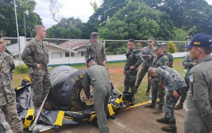 <p><strong>BOOSTING INTEROPERABILITY.</strong> Marine troops of the Philippines and the United States participate in an activity of the exercises dubbed "Marine Aviation Support Activity 2022" (MASA 22), which began on Monday (June 6, 2022). The AFP said the integrated and joint interoperability activities include coastal defense forward arming and refueling, and subject matter exchanges for unmanned aviation systems and engineering with participants from the Naval Air Wing of the Philippine Navy and the Philippine Air Force. <em>(Photo courtesy of AFP)</em></p>