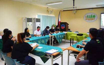 <p><strong>COLLABORATION.</strong> Officials of Central Luzon State University and the Department of Trade and Industry in Nueva Ecija sign the memorandum of agreement on Wednesday (June 8, 2022) to accelerate a learning program that will benefit micro, small and medium enterprises (MSMEs). The program involves the implementation of engaging Food and Agricultural Resources Management (eFARM) Academy, a Commission on Higher Education (CHED)-funded program that aims "to provide learnings on how to address the needs of the community towards sustainable agriculture" amid the coronavirus disease 2019 (Covid-19) pandemic. <em>(Contributed Photo)</em></p>