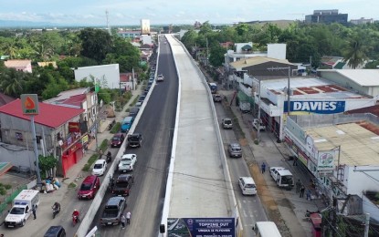 <p><strong>LEGACY</strong>. The Ungka II flyover at the junction of the Sen. Benigno Aquino Jr. Avenue and the Felix Gorriceta Jr. Avenue in the municipality of Pavia is expected to open before June 30, 2022. It is considered one of the legacy projects of President Rodrigo R. Duterte in Iloilo. <em>(Photo courtesy of DPWH Region 6)</em></p>