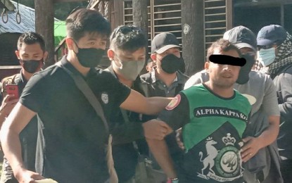 <p><strong>OVERSTAYING ALIENS.</strong> Authorities separately arrest two foreigners Wednesday (June 8, 2022) in Basilan and Zamboanga City for overstaying in the country. Arrested in Basilan are Zain Ul Abideen, a Pakistani (in green t-shirt), and Rafshad Cherikal Phutiyapurayil, an Indian (not in photo), who was arrested in Zamboanga City. <em>(Photo courtesy of Naval Forces Western Mindanao)</em></p>