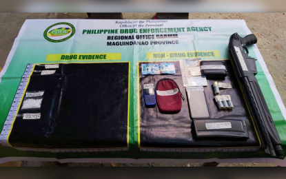 <p><strong>SEIZED DRUGS, FIREARM.</strong> The illegal drugs and unlicensed firearm seized from a former local government employee and cohort after they were busted by anti-narcotic agents in Maguindanao Sunday (June 12, 2022). Among the pieces of evidence seized from them are PHP102,000 worth of shabu and a shotgun.<em>(Photo courtesy of PDEA-BARMM)</em></p>