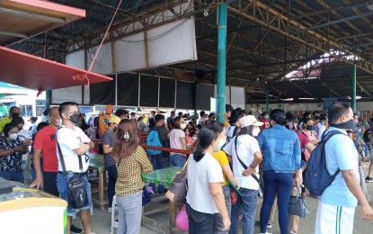 <p><strong>WAITING.</strong> Passengers at the terminal in Mohon, Arevalo wait for jeepneys on the second day of the implementation of the Local Public Transport Route Plan (LPTRP) on Monday (June 13, 2022). Iloilo City Mayor Jerry Treñas said the city government is ready to make adjustments when needed. <em>(PNA contributed photo)</em></p>