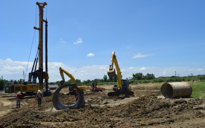 <p><strong>NEW BRIDGE.</strong> A new bridge designed to ease traffic is now underway in Sta. Rosa, Nueva Ecija. The 0.68-kilometer, two-lane Eliseo Trinidad Angeles Bridge along the Pampanga River will not only provide an alternative route to motorists but will also help improve the flow of vehicles in the area. <em>(Photo courtesy of DPWH-3)</em></p>