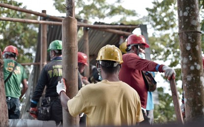<p><strong>EVICTION.</strong> Demolition teams dismantle makeshift houses in Upper Dagong, Zayas, Barangay Carmen, Cagayan de Oro City, Tuesday (June 14, 2022). Some 7,000 informal settlers were removed by the police from the area without protest. <em>(Photo courtesy of Rhoel Condeza/Cagayan de Oro CIO)</em></p>