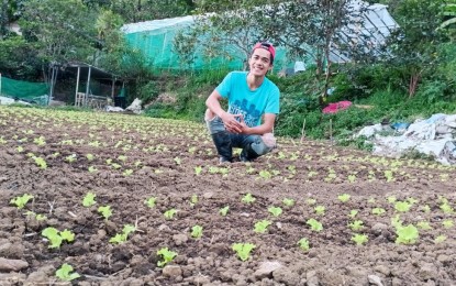 <p><strong>YOUNG FARMER</strong>. Ryan Palunan, the Cordillera president of the Regional Agri-Fisheries Council, shows his family's backyard farm in this undated photo in Baguio City. On Wednesday (June 15, 2022) Palunan said that the Agricultural Training Institute (ATI), the training arm of the Department of Agriculture (DA), has launched the Kapatid Agri Mentor Me Program (KAMMP) in Cordillera. <em>(PNA photo courtesy of Ryan Palunan)</em></p>