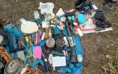 <p><strong>SEIZED WAR MATERIEL.</strong> Two improvised explosive devices, a high-powered firearm, and ammunition seized by troopers of the 30th Infantry Battalion after a 30-minute skirmish with communist New People’s Army rebels Tuesday (June 14, 2022) in San Francisco municipality, Surigao del Norte province. The encounter broke out after villagers reported the presence of the NPA rebels in the area.<em> (Photo courtesy of 30IB)</em></p>