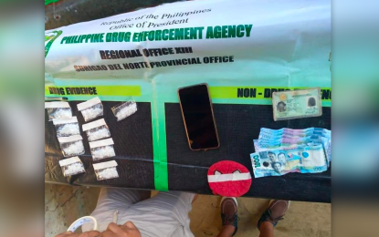 <p><strong>EVIDENCE.</strong> The pieces of evidence that anti-narcotics managed to seize from suspect Roland Diago Mascardo, a former town councilor in Socorro municipality, in Surigao del Norte. Mascardo, 37, was arrested Wednesday (June 15, 2022). <em>(Photo courtesy of Ed Mapayo)</em></p>