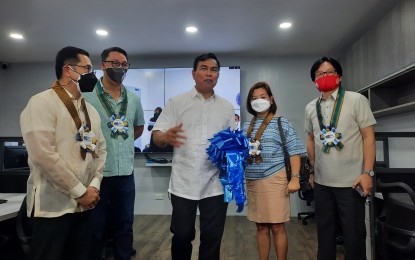 <p><strong>STATE-OF-THE-ART LAB.</strong> Cybercrime Investigation and Coordinating Center (CICC) Executive Director Cezar Mancao II (middle) led the inauguration of the country's first Digital Forensics Platform and Laboratory (DFPAL) at the CICC office in Quezon City on Friday (June 17, 2022). The laboratory, he said, will be used to boost the country's fight against online sexual abuse and the exploitation of children. <em>(PNA photo by Raymond Carl Dela Cruz)</em></p>