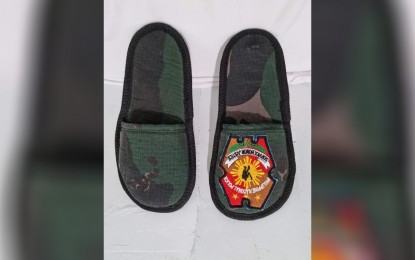 <p><strong>RECYCLED PNP UNIFORMS</strong>. An old police uniform from the Ilocos Norte police is repurposed into a pair of slippers. Recycled police uniforms like this will be showcased at the Ilocos Norte Provincial Police’s Sports Festival on July 9, 2022. <em>(Contributed)</em></p>