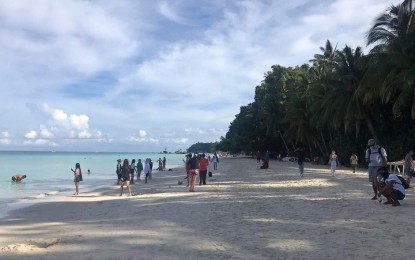 <p><strong>NEW BORACAY</strong>. The white sand beach of the newly-rehabilitated Boracay Island in this undated photo. Direct flights coming from Incheon, South Korea are expected to boost foreign arrivals on the island between the third and fourth quarter of 2022, according to Tourism Regional Director for Western Visayas Cristine Mansinares on Friday (June 17, 2022). <em>(Photo courtesy of DENR Region VI)</em></p>