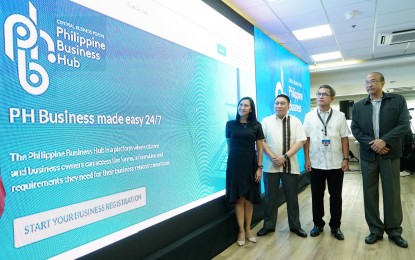 <p><strong>EASE OF DOING BUSINESS</strong>. Anti-Red Tape Authority officer-in-charge Ernesto Perez (3rd from left) and ARTA deputy director general Carlos Quita (rightmost) lead the relaunch of Central Business Portal, now Philippine Business Hub, in Quezon City on June 20, 2022. The online platform aims to further ease doing business in the country by reducing steps and periods of starting a business to one step and seven days. <em>(PNA photo by Ben Briones)</em></p>