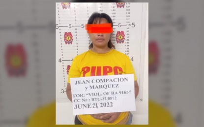 <p><strong>DRUG SUSPECT FALLS.</strong> Top Negrense drug personality Jean Marquez Compacion, 31, was served a warrant of arrest at her residence in Barangay Rizal, San Carlos City, Negros Occidental on Tuesday (June 21, 2022). She is the number two personality in the illegal drugs watchlist and the third most wanted person of the San Carlos Component City Police Station. <em>(Photo courtesy of NegOcc-San Carlos Component City Police Station)</em></p>