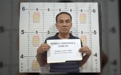 <p><strong>MULTIPLE CASES.</strong> Romeo Lonzanida, former San Antonio, Zambales town mayor, during his arrest for illegal possession of firearms on Oct. 22, 2019. At the time of his arrest, he was in hiding for 10 years after being convicted of falsification of public documents. <em>(PNP file photo)</em></p>