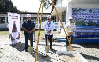 <p><strong>GROUNDBREAKING.</strong> Defense Undersecretary for Acquisition and Resource Management Raymundo Elefante (center); PAF Air Defense Command head Maj. Gen. Augustine Malinit (left); and Novacell Telecom Corp. vice president for sales and marketing Ricardo Pinsotes (right) lead the groundbreaking ceremony for the construction of the Martin-Baker ejection seat maintenance facility at Basa Air Base, Floridablanca, Pampanga on Tuesday (June 21, 2022). Egress components, also known in Air Force parlance as ejection systems, are used by pilots to safely propel themselves out of malfunctioning or badly damaged aircraft. <em>(Photo courtesy of Philippine Air Force)</em></p>