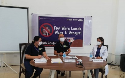 <p><strong>INDIVIDUAL EFFORT</strong>. Antique Integrated Provincial Health Officer Dr. Ric Noel Naciongayo (center) with Nurse 4 Sheree Vego (left) and Dr. Ellen Grace Balinas (right) during a press conference on dengue on Thursday (June 23, 2022). Naciongayo said individual efforts should be done to clean households as the province recorded 979 dengue cases as of June 19, which is 355 percent higher than the 215 cases recorded during the same period in 2021. <em>(PNA photo by Annabel Consuelo J. Petinglay)</em></p>