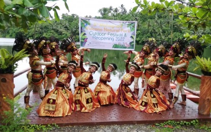 <p><strong>READY FOR VISITORS</strong>. The Buraburon Festival dancers pose during the reopening of Mahagnao Volcano Natural Park (MVNP) in Mahagnao village in Burauen, Leyte on Wednesday (June 22, 2022). The MVNP, the site known for lakes and thousands of wild ducks, has officially opened after more than two years of closure and limited operations due to Covid-19 pandemic. <em>(PNA photo by Sarwell Meniano)</em></p>