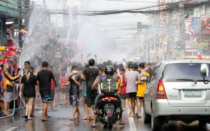 <p><strong>WET CELEBRATION.</strong> San Juan City residents are out on the streets to celebrate the “Wattah Wattah” festival on Friday (June 24, 2022). The event that celebrates the feast of John the Baptist was canceled for the past two years due to Covid-19 restrictions.<em> (PNA photo by Joey Razon)</em></p>