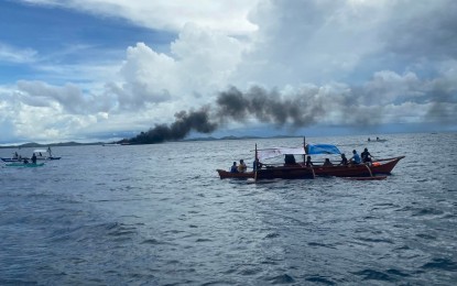 <p><strong>RESCUED.</strong> Some of the motor bancas that rescued passengers of the ill-fated Leyte-bound ferry in the islands of Bohol Sunday afternoon. At least one passenger died and three remained missing after a Leyte-bound ferry caught fire, the Philippine Coast Guard reported early Monday. <em>(Photo courtesy of Marcos Vicente)</em></p>