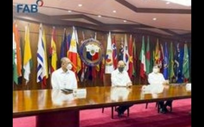 <p><strong>DEFENSE INDUSTRIAL ESTATE</strong>. Government Arsenal director Arnold Rafael Depakakibo (left), together with Defense Secretary Delfin Lorenzana (center) and Authority of the Freeport Area of Bataan (AFAB) administrator Emmanuel Pineda on Monday (June 27, 2022) sign a memorandum of agreement on the proposed declaration of the Defense Industrial Estate as the newest expansion area of the Freeport Area of Bataan. The signing was held at the Department of National Defense building in Camp Aguinaldo, Quezon City.<em> (Photo courtesy of AFAB)</em></p>
